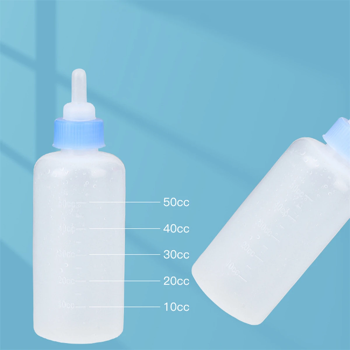 1 Set 50cc Pet Cat Milk Bottle Dog Cat Silicone Milk Bottle Portable Kitten Feeding Drinking Water Milk Nursing Bottle Red/Blue
