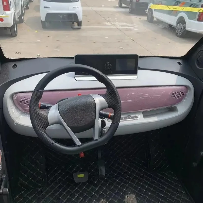 Factory Direct Sales Four-Wheel Electric Mini Car Leather Seats Single Drive Made China Cheap Electric Vehicle Lead Acid Battery